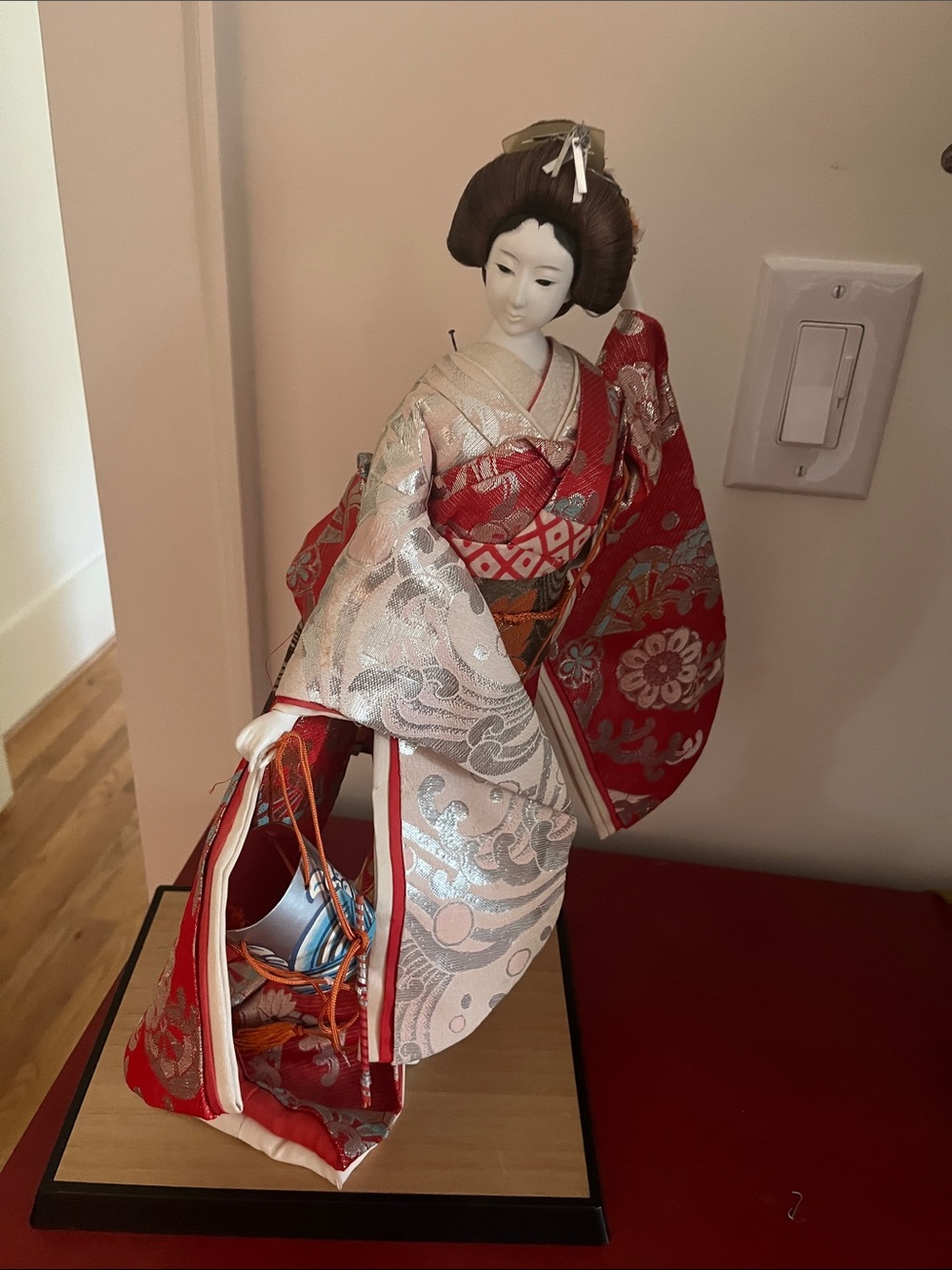 Vintage Geisha with purse mounted on platform